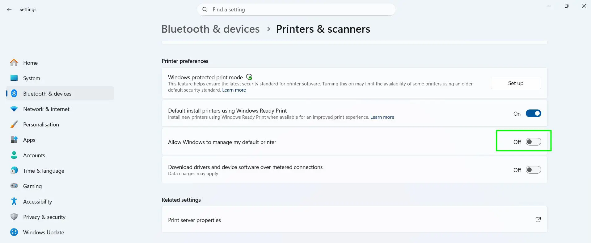 Scroll down to Printer preferences and turn off "Allow Windows to manage my default printer."